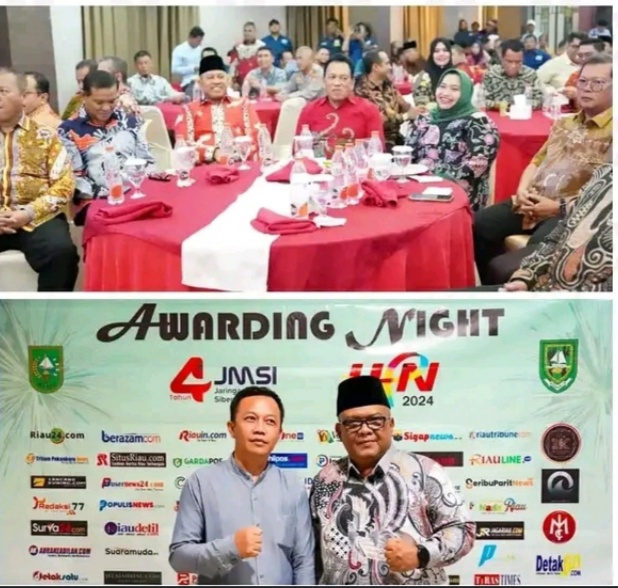 Pemberian Pin Emas kepada Bupati Kabupaten Bengkalis Kasmarni,Di HUT JMSI Ke 4 Tahun
