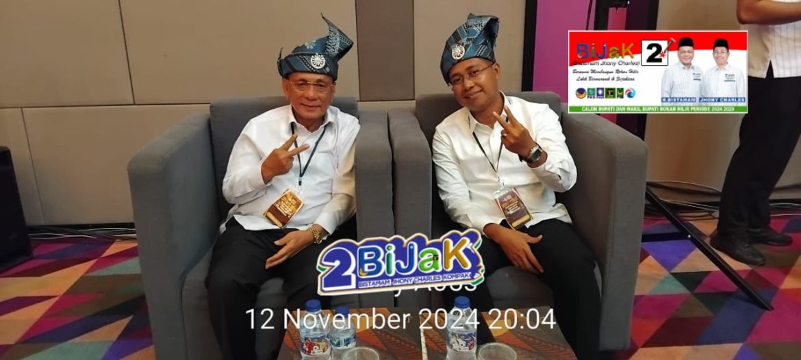 Pasangan Calon Bupati dan Wakil Bupati Rokan Hilir, H. Bistamam dan Jhony Charles, Disambut Meriah Saat Memasuki Ruang Debat Publik
