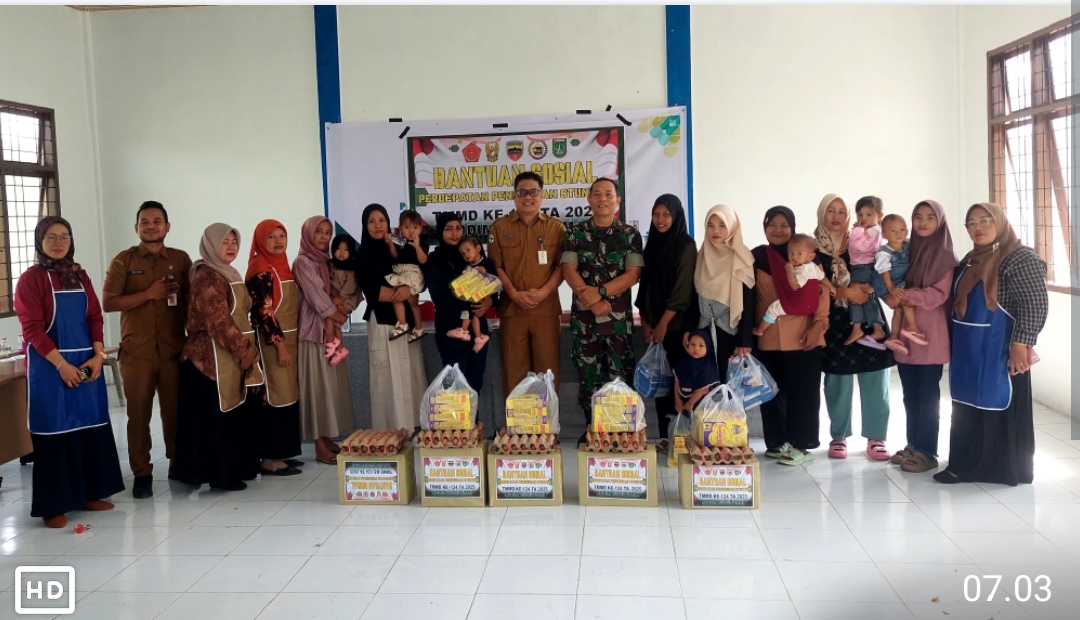 *Pemberian Bantuan Sosial Percepatan Penurunan Stunting di Kel. Bukit Kayu Kapur dalam Rangkaian TMMD Ke-124 Kodim 0320 Dumai*