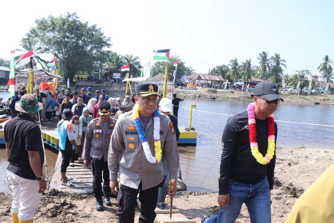 Kapolres Rohil Hadiri Pembukaan Pacu Sampan dan Pacu Boat di Pulau Tilan, Rantau Bais