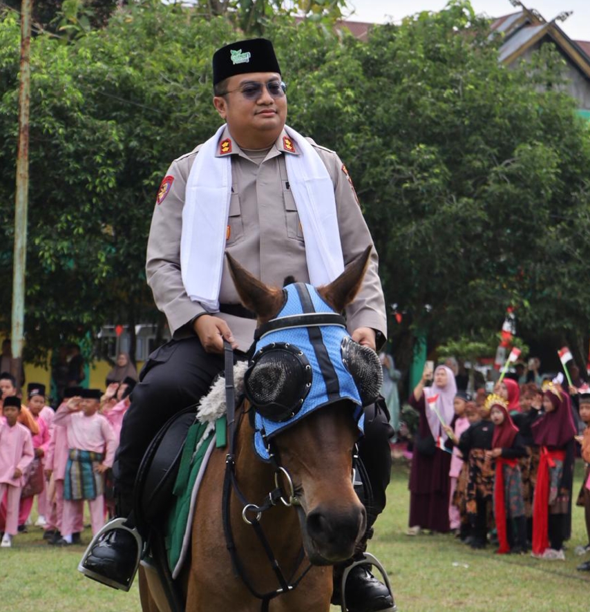 Kapolres Rohil Pimpin Apel Tahunan Al-Majidiyah, Tanam Pohon Lewat Green Policing